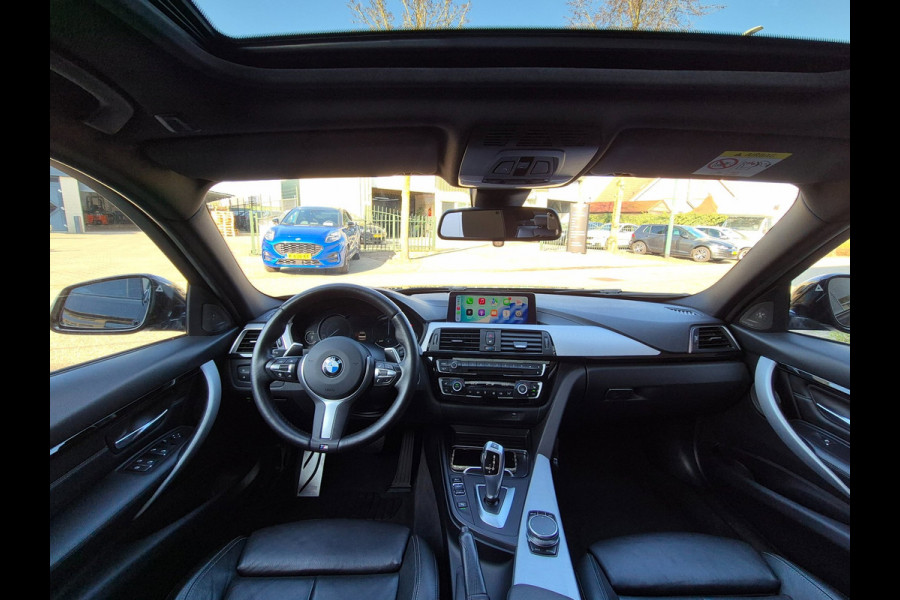 BMW 3-serie 320i M Sport ACC Apple CarPlay Camera Schuifdak Lane assist volle optieslijst H&K High Executive