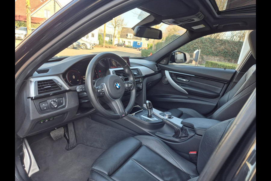 BMW 3-serie 320i M Sport ACC Apple CarPlay Camera Schuifdak Lane assist volle optieslijst H&K High Executive
