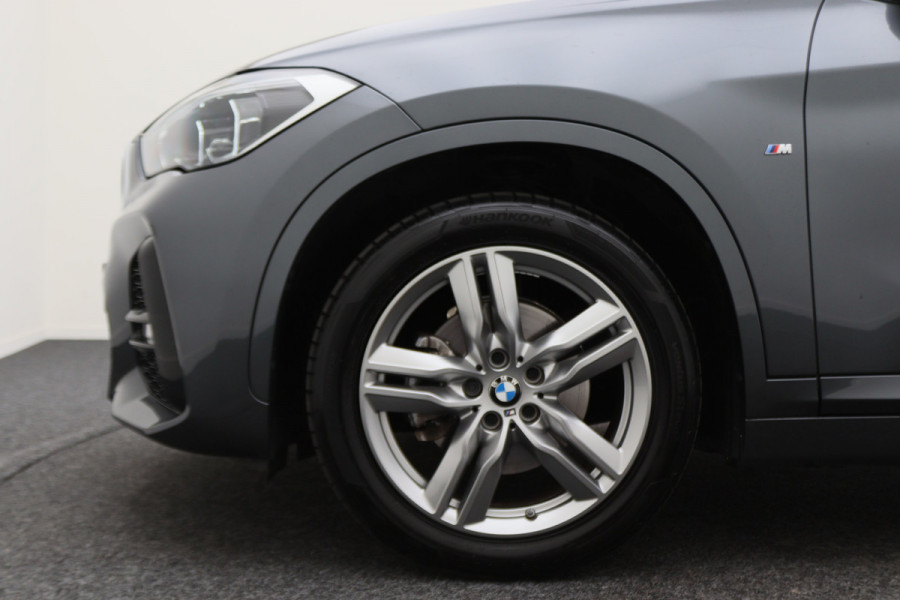 BMW X1 sDrive18i High Executive M Sport Leer, ACC, Camera, Trekhaak, Navigatie, PDC, 18"