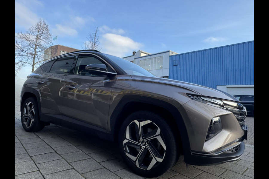 Hyundai Tucson 1.6 T-GDI HEV Premium- Navigatie I Leer I Airco I Sport velgen I LED I PDC I Dealer onderhouden