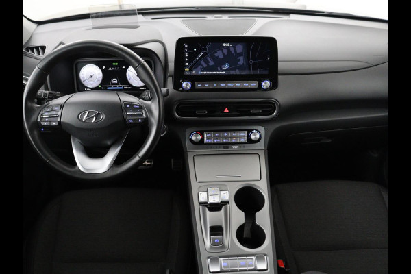 Hyundai Kona EV Fashion 64 kWh | SOH 100% | 3 Fase | Head-Up | Warmtepomp | Adaptive cruise | Camera | Carplay | Keyless | Full LED | Navigatie | Climate control