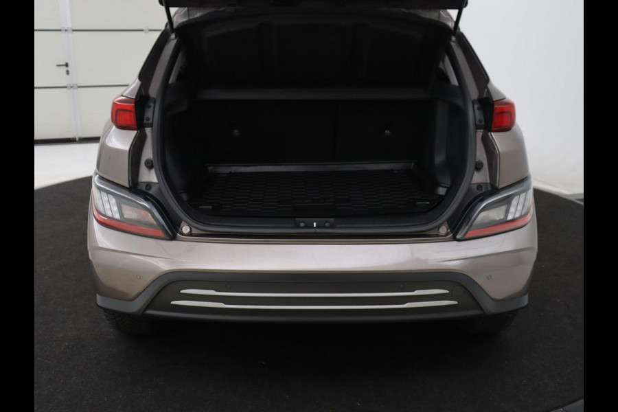 Hyundai Kona EV Fashion 64 kWh | SOH 100% | 3 Fase | Head-Up | Warmtepomp | Adaptive cruise | Camera | Carplay | Keyless | Full LED | Navigatie | Climate control