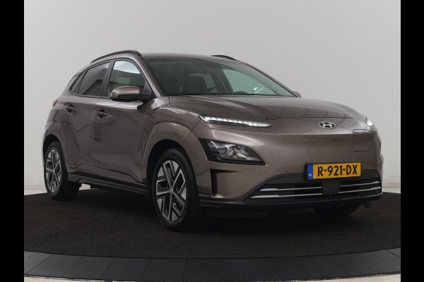 Hyundai Kona EV Fashion 64 kWh | SOH 100% | 3 Fase | Head-Up | Warmtepomp | Adaptive cruise | Camera | Carplay | Keyless | Full LED | Navigatie | Climate control