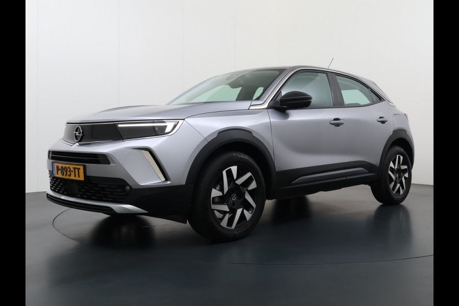 Opel Mokka T 131pk Elegance Navi Camera Apple Carplay Android PDC Auto bord-herkenning ECC Cruise Control Pdc Elegance Lmv Led Isofix Lane Assist Regen-Lichtsensor  Virtual Cockpit 1.2 turbo 1e Eigenaar (door ons-) Dealeronderhouden Origineel NLse auto