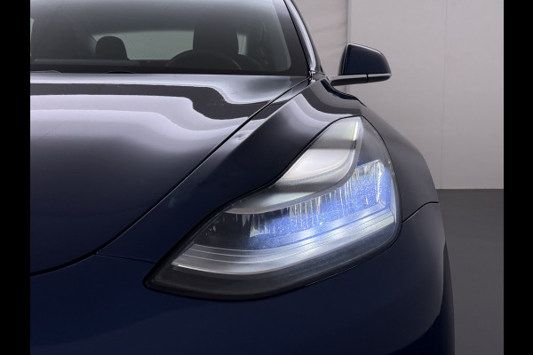Tesla Model 3 SR+ 325PK Trekhaak AutoPilot Leer PanoramaDak Adaptive Cruise Lmv 18" Camera's Elektr.-Stuur+Stoelen+Spiegels+Geheugen+Easy-Entr Soh 83% Ecc Navi Led DAB Voorverwarmen interieur via App Keyless One-Pedal-Drive 1.000KG Trekgewicht 1e Eigenaar Origineel Nederlandse Auto Fabrieksgarantie op Accu en Motor tot 160.000km/04-12-2027