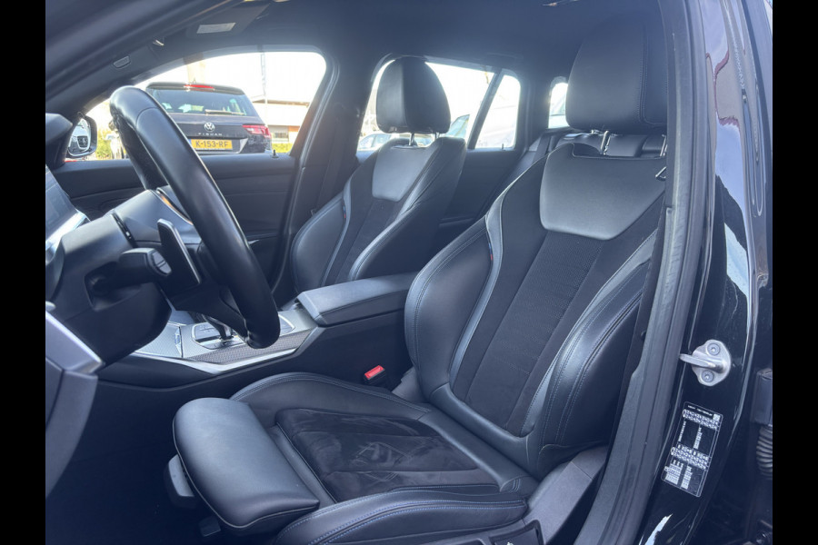 BMW 3 Serie Touring 318i Business Edition | M Pakket | Sfeerverlichting | Apple Carplay | Parkeercamera