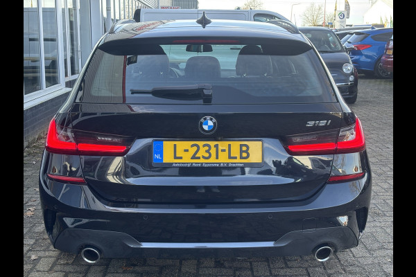 BMW 3 Serie Touring 318i Business Edition | M Pakket | Sfeerverlichting | Apple Carplay | Parkeercamera