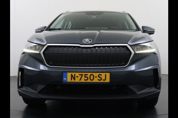 Škoda ENYAQ iV 80 Trekhaak Adap.Cruise 3 Fase Warmtepomp Camera Apple Carplay/Android Auto Navi Ecc Pdc Assistentie+Climate Pakket Led Lmv Stoel+Stuurverwarming Lane Assist File Assistent Bluetooth Isofix Keyless-go Connected services Dodehoek detector 1e Eigenaar Origineel Nederlandse Auto 1.000KG Trekgewicht