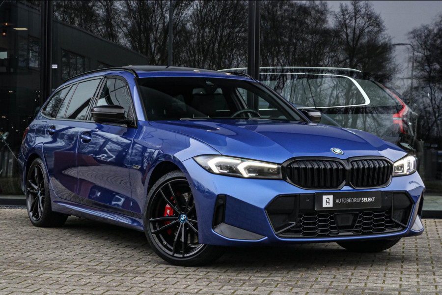 BMW 3 Serie Touring 330e | M-Sport Pro | Pano | 2 jaar garantie | ACC | LCI | Black Edition | Sfeerverlichting | Driving Assistant