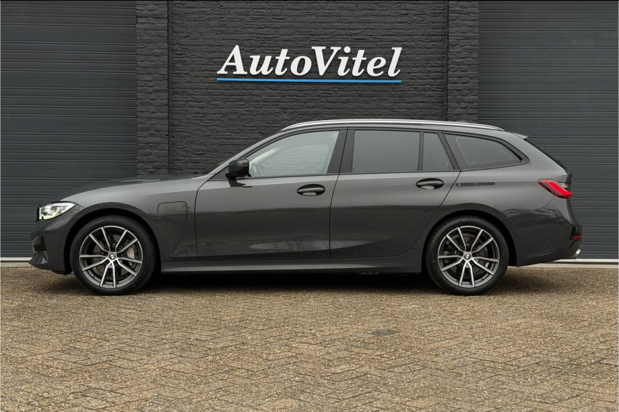 BMW 3 Serie Touring 330e xDrive | Sportleder | Head-Up | Laserlicht | Comfort Access | Memory