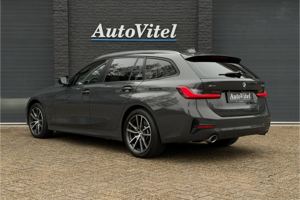 BMW 3 Serie Touring 330e xDrive | Sportleder | Head-Up | Laserlicht | Comfort Access | Memory