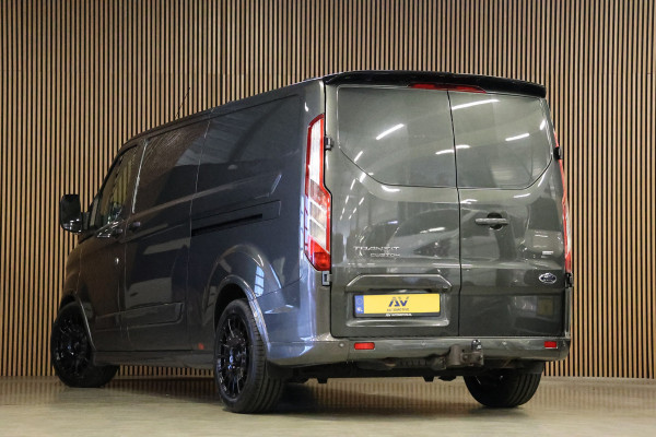 Ford Transit Custom 310 2.0 TDCI L2H1 Sport | L+R Schuifdeur | CarPlay | Bi-Xenon | Camera | Stoelverwarming | Standkachel | Dakdragers | Trekhaak | Nieuwe APK | 3-Zitter | Automaat