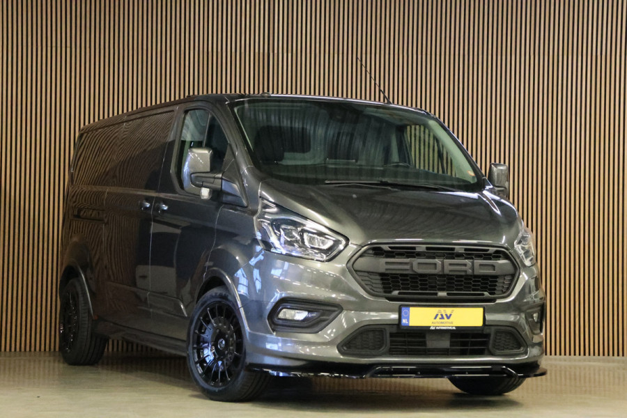 Ford Transit Custom 310 2.0 TDCI L2H1 Sport | L+R Schuifdeur | CarPlay | Bi-Xenon | Camera | Stoelverwarming | Standkachel | Dakdragers | Trekhaak | Nieuwe APK | 3-Zitter | Automaat