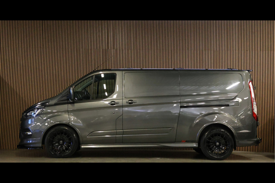 Ford Transit Custom 310 2.0 TDCI L2H1 Sport | L+R Schuifdeur | CarPlay | Bi-Xenon | Camera | Stoelverwarming | Standkachel | Dakdragers | Trekhaak | Nieuwe APK | 3-Zitter | Automaat