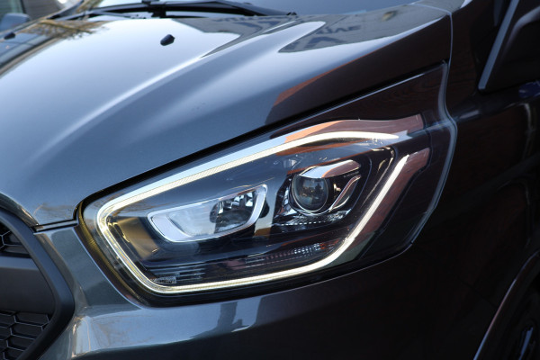 Ford Transit Custom 310 2.0 TDCI L2H1 Sport | L+R Schuifdeur | CarPlay | Bi-Xenon | Camera | Stoelverwarming | Standkachel | Dakdragers | Trekhaak | Nieuwe APK | 3-Zitter | Automaat