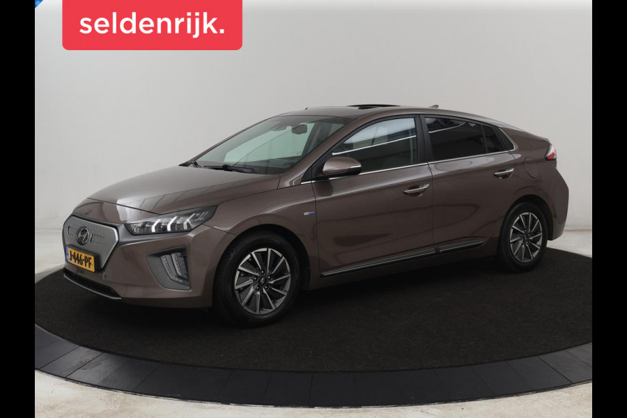 Hyundai IONIQ Premium EV 38 kWh | SOH 100% | Schuifdak | Stoelventilatie | Leder | Warmtepomp | Adaptive cruise | Camera | Achterbankverwarming | Carplay | Infinity Sound | Memory | Full LED | Keyless