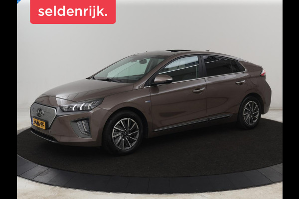 Hyundai IONIQ Premium EV 38 kWh | SOH 100% | Schuifdak | Stoelventilatie | Leder | Warmtepomp | Adaptive cruise | Camera | Achterbankverwarming | Carplay | Infinity Sound | Memory | Full LED | Keyless