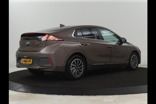 Hyundai IONIQ Premium EV 38 kWh | SOH 100% | Schuifdak | Stoelventilatie | Leder | Warmtepomp | Adaptive cruise | Camera | Achterbankverwarming | Carplay | Infinity Sound | Memory | Full LED | Keyless
