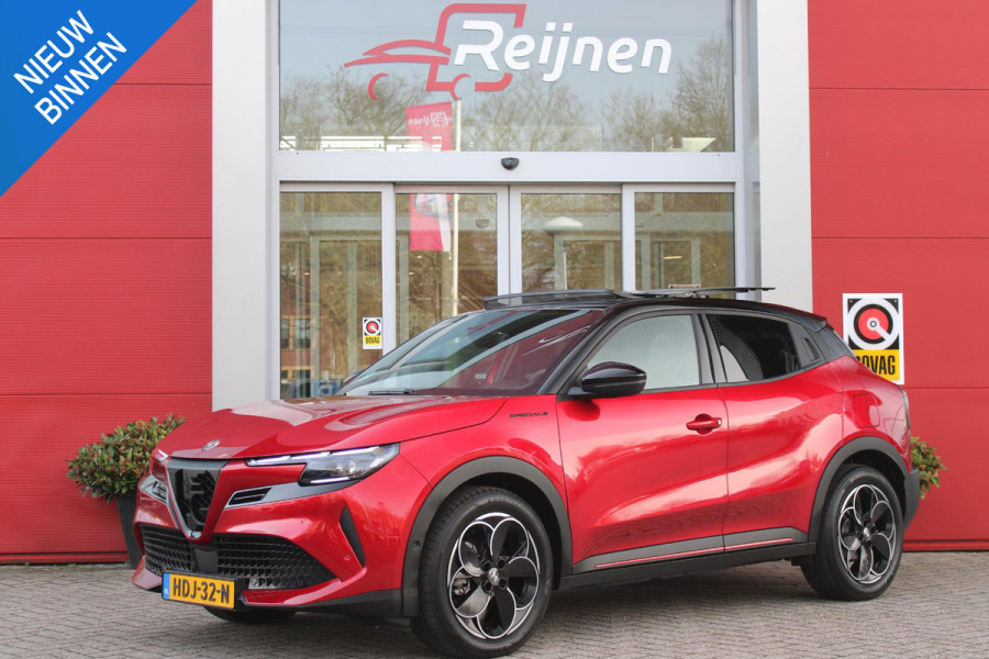 Alfa Romeo junior Alfa Romeo Junior ELETTRICA SPECIALE 156PK 54 kWh | PANORAMISCH SCHUIF/KANTEL DAK | BICOLOR DAK (ZWART DAK) | TECHNOLOGIE PAKKET (O.A. FULL LED ADAPTIVE MATRIX KOPLAMPEN/DODEHOEK DETECTIE/DRAADLOZE TELEFOONLADER/ACHTERUITRIJ CAMERA/PARKEERSENSOREN VOOR, ACHTER,ZIJKANT) | DRAADLOZE APPLE CARPLAY/ANDROID AUTO | CLIMATE CONTROL | ELEKTRISCH BEDIENBARE ACHTERKLEP | STOEL VERWARMING | ELEKTRISCH BEDIENBARE VOORSTOEL | VERKEERSBORDEN HERKENNING | ADAPTIVE CRUISE CONTROL | KEYLESS ENTRY/START |