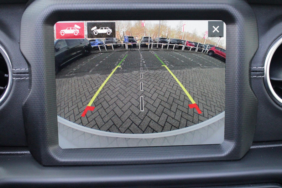 Jeep Wrangler Unlimited 4xe 380PK SAHARA OVERLAND | TRAILRATED | NAVIGATIE | APPLE CARPLAY/ANDROID AUTO | ACHTER/VOOR CAMERA | UITNEEMBARE DAKPLATEN | HARDTOP IN KLEUR | LEDEREN BEKLEDING | STOEL/STUUR VERWARMING | LED KOPLAMPEN | ADAPTIVE CRUISE CONTROL | TREE PLANKEN | HARD WHEELCOVER |