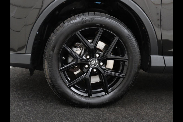 Toyota RAV4 2.5 Hybrid Black Edition | Schuifdak | Trekhaak | Adaptive cruise | Camera | Navigatie | Climate control | Bluetooth | 18'' | Getint glas