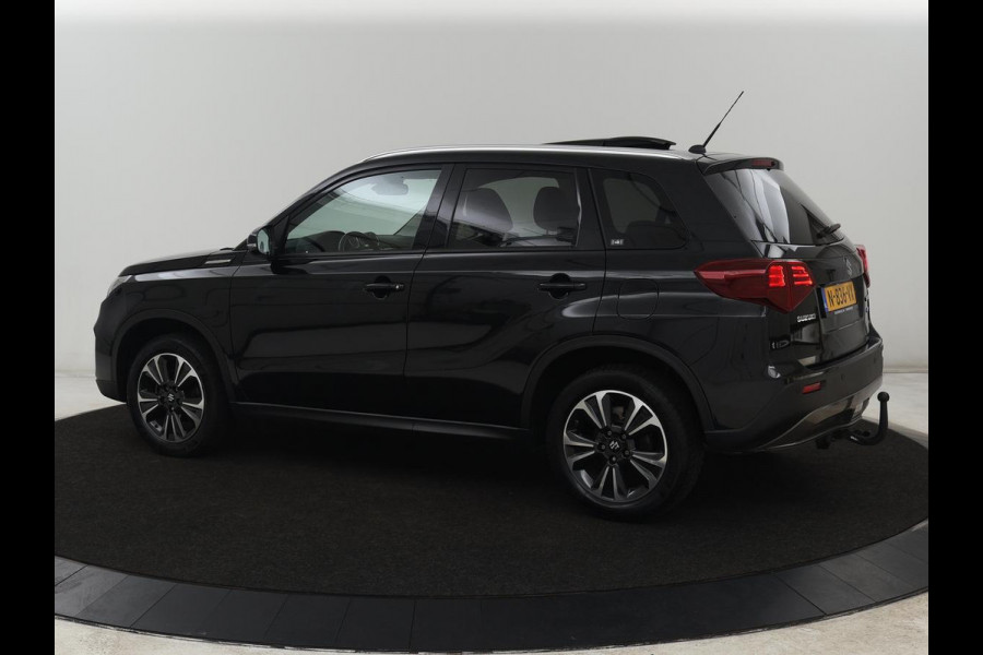 Suzuki Vitara 1.4 Boosterjet Style Smart Hybrid | Panoramadak | Leder/Alcantara | Stoelverwarming | Trekhaak | Camera | Carplay | Navigatie | Keyless | Full LED | Adaptive cruise | Climate control