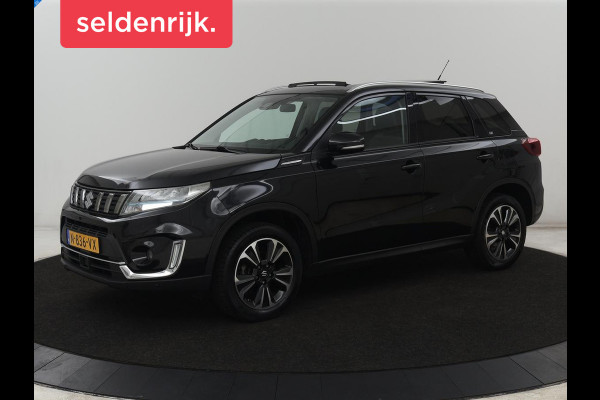 Suzuki Vitara 1.4 Boosterjet Style Smart Hybrid | Panoramadak | Leder/Alcantara | Stoelverwarming | Trekhaak | Camera | Carplay | Navigatie | Keyless | Full LED | Adaptive cruise | Climate control