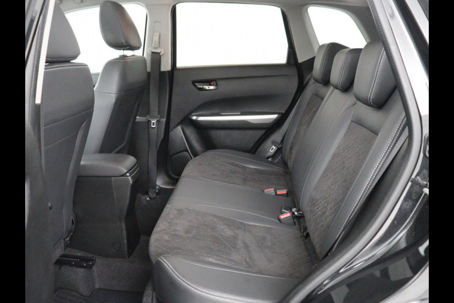 Suzuki Vitara 1.4 Boosterjet Style Smart Hybrid | Panoramadak | Leder/Alcantara | Stoelverwarming | Trekhaak | Camera | Carplay | Navigatie | Keyless | Full LED | Adaptive cruise | Climate control