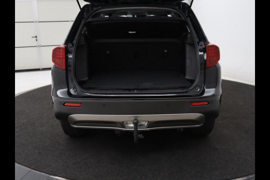 Suzuki Vitara 1.4 Boosterjet Style Smart Hybrid | Panoramadak | Leder/Alcantara | Stoelverwarming | Trekhaak | Camera | Carplay | Navigatie | Keyless | Full LED | Adaptive cruise | Climate control