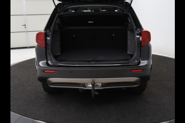 Suzuki Vitara 1.4 Boosterjet Style Smart Hybrid | Panoramadak | Leder/Alcantara | Stoelverwarming | Trekhaak | Camera | Carplay | Navigatie | Keyless | Full LED | Adaptive cruise | Climate control