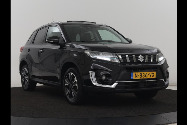 Suzuki Vitara 1.4 Boosterjet Style Smart Hybrid | Panoramadak | Leder/Alcantara | Stoelverwarming | Trekhaak | Camera | Carplay | Navigatie | Keyless | Full LED | Adaptive cruise | Climate control
