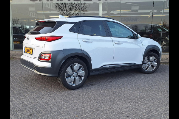 Hyundai Kona EV Fashion 64 kWh | SOH: 96,4% | 3 Fase | Warmtepomp | HUD | Navi | Adaptive CC | Blindspot |