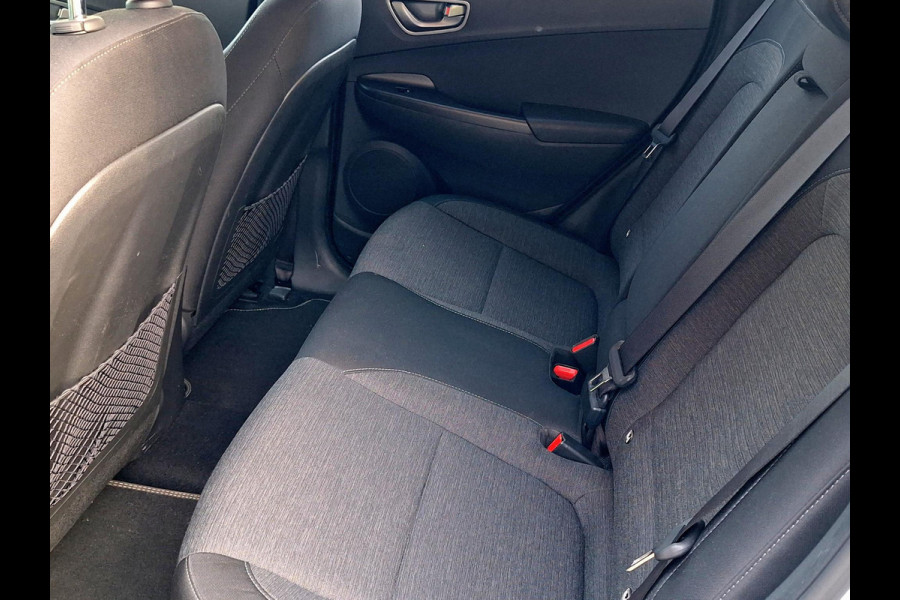 Hyundai Kona EV Fashion 64 kWh | SOH: 96,4% | 3 Fase | Warmtepomp | HUD | Navi | Adaptive CC | Blindspot |