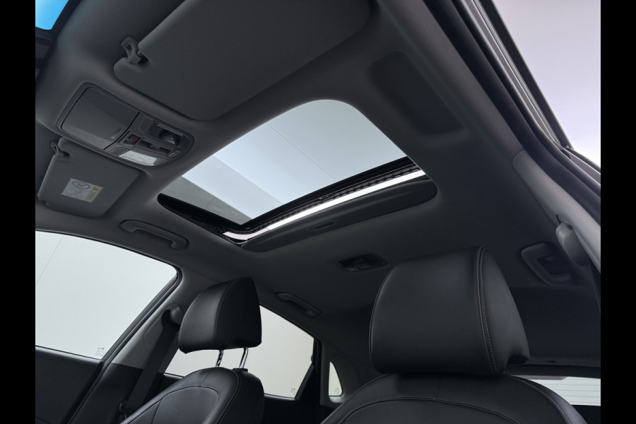 Hyundai Kona EV 64kWh 204pk SOH 100% Premium Schuif-/Kanteldak Leer Warmtepomp Head-Up Display Apple Carplay Android Navi Camera Elektr.Stoel Pdc Subwoofer Bluetooth Dodehoek detector Privacy Glas Rijstrooksensor 1e Eigenaar Origineel Nederlandse Auto Volledig Dealeronderhouden