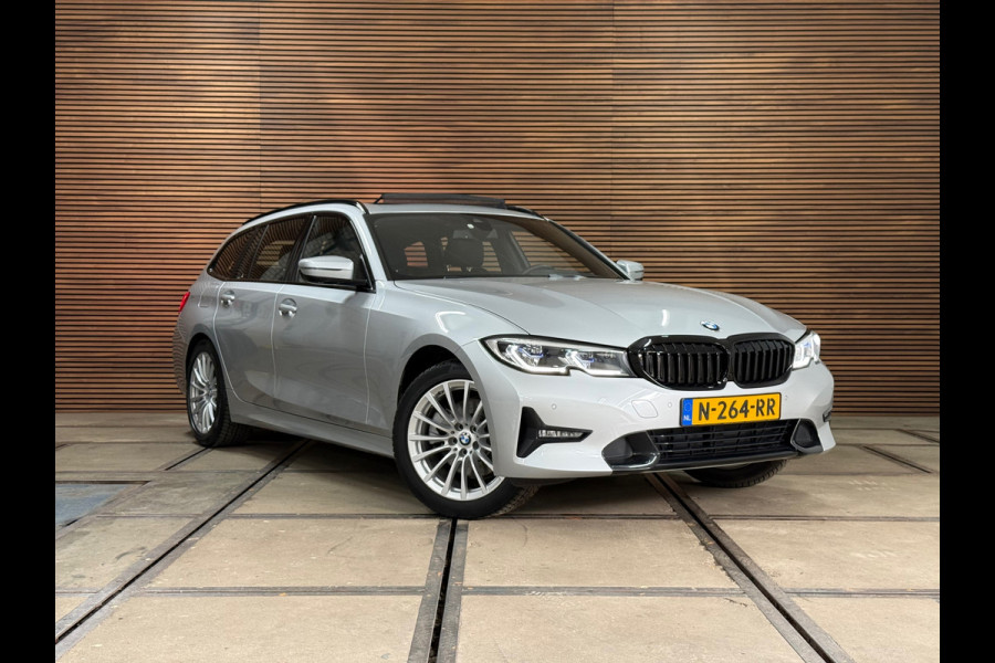 BMW 3 Serie Touring 320e Sportline | Pano | Leder | Laser | Shadow Line | Trekhaak elektr. | 18 inch | Stoelverwarming