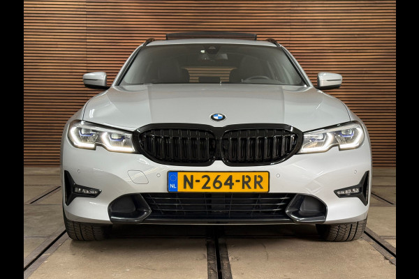 BMW 3 Serie Touring 320e Sportline | Pano | Leder | Laser | Shadow Line | Trekhaak elektr. | 18 inch | Stoelverwarming