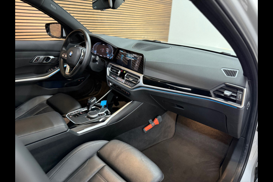BMW 3 Serie Touring 320e Sportline | Pano | Leder | Laser | Shadow Line | Trekhaak elektr. | 18 inch | Stoelverwarming