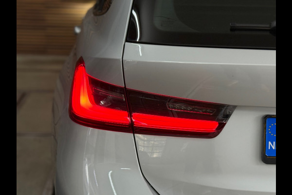 BMW 3 Serie Touring 320e Sportline | Pano | Leder | Laser | Shadow Line | Trekhaak elektr. | 18 inch | Stoelverwarming