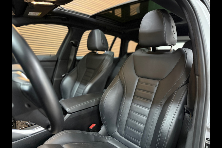 BMW 3 Serie Touring 320e Sportline | Pano | Leder | Laser | Shadow Line | Trekhaak elektr. | 18 inch | Stoelverwarming