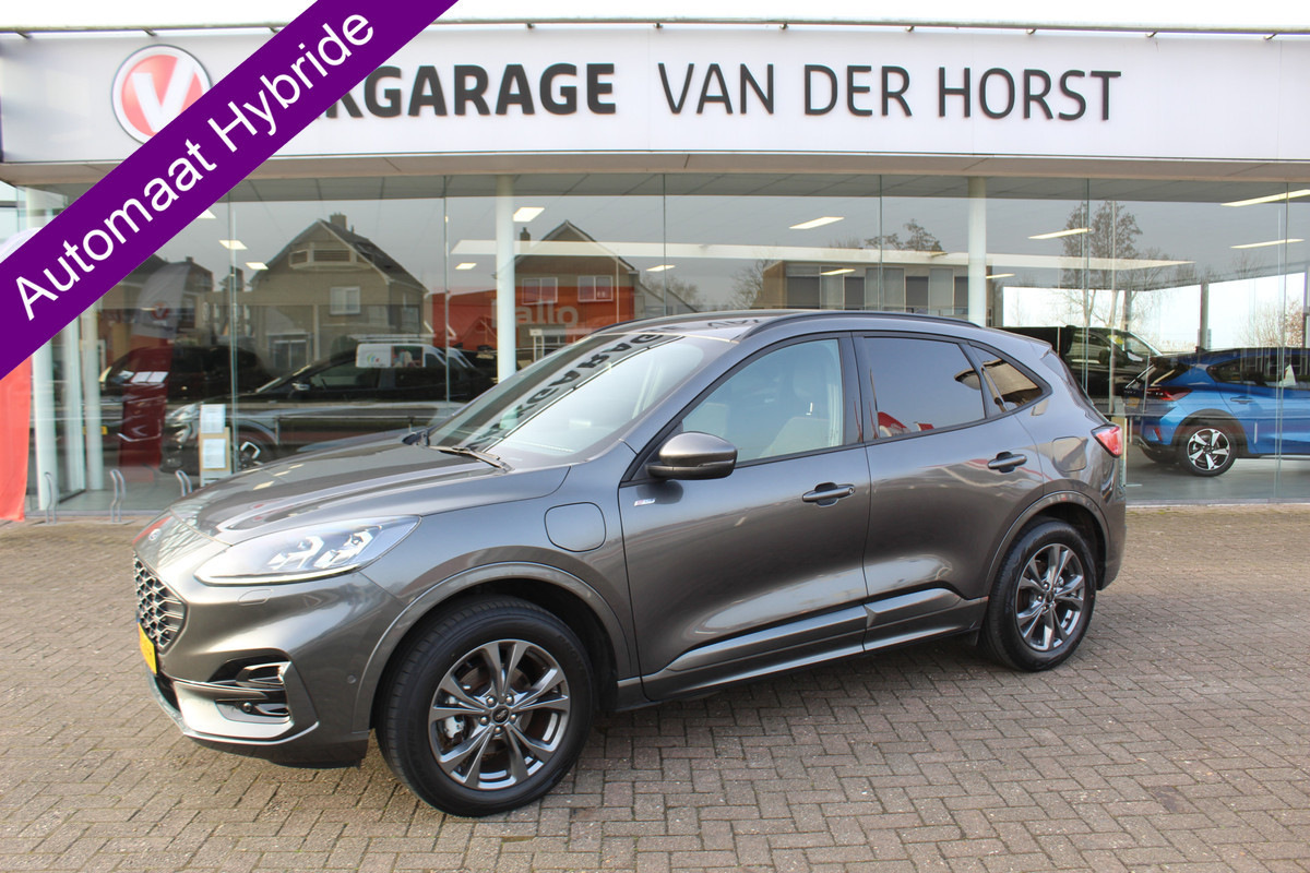 Ford Kuga 2.5-225pk Plug-in Hybrid ST-Line X. Hybride rijden voor een reële prijs ! Adaptive Cruise Control, Stoel-, achterbank, stuur- en voorraamverwarming, autm. airco dual, camera v+a, elektr. achterklep, side- en lane assist etc.
