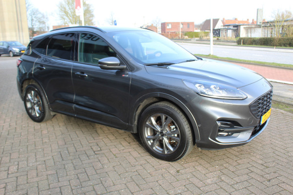 Ford Kuga 2.5-225pk Plug-in Hybrid ST-Line X. Hybride rijden voor een reële prijs ! Adaptive Cruise Control, Stoel-, achterbank, stuur- en voorraamverwarming, autm. airco dual, camera v+a, elektr. achterklep, side- en lane assist etc.