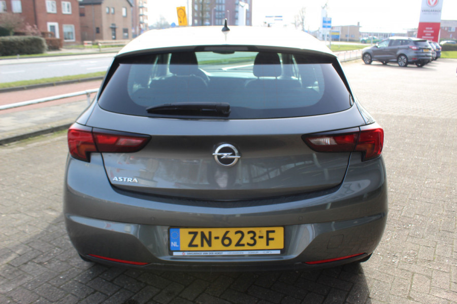 Opel Astra 1.0 Turbo Online Edition 5deurs , zeer nette auto Climate control , Cruise control , Navigatie , Bluetooth Parkeersensoren achter en voor