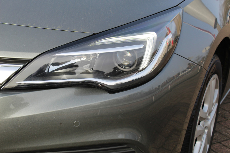 Opel Astra 1.0 Turbo Online Edition 5deurs , zeer nette auto Climate control , Cruise control , Navigatie , Bluetooth Parkeersensoren achter en voor