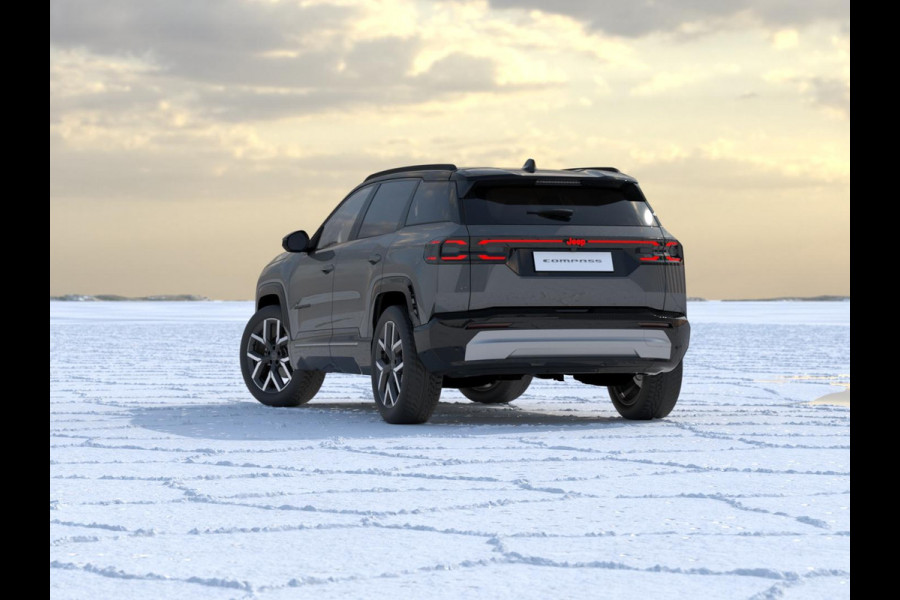 Jeep Compass First Edition 74 kWh | Uit voorraad leverbaar !| Adapt. Cruise | Camera | Carplay | 20" | Elektr. A-Klep | Navi | Winter Pack | Schuif/Kanteldak | Premium Pack | Conv. Pack | Warmtepomp