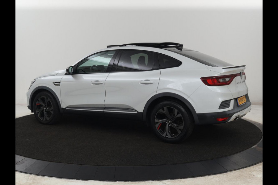 Renault Arkana 1.6 E-Tech Hybrid 145 R.S. Line | Panoramadak | Leder/Alcantara | Trekhaak | Stoelverwarming | Adaptive cruise | Camera | Carplay | Keyless | Park Assist | Full LED | Navigatie | Stuurverwarming