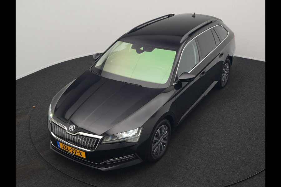 Škoda Superb Combi 1.4 TSI iV Business Edition Plus Plug In Hybrid 218pk PHEV | Trekhaak Af Fabriek | Crystal LED | Canton Audio | Sportstoelen & Stuur Verwarmd | Camera | Keyless | Cruise Control | Navigatie | Apple Carplay | Virtual | DAB | 17"L.M |