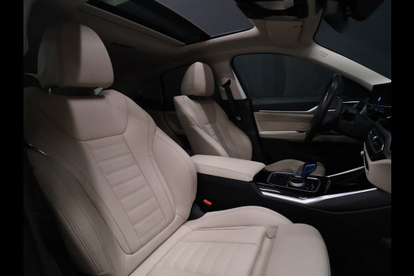 BMW i4 eDrive40 84 kWh [SCHUIFKANTELDAK, ADAPTIVE CRUISE CONTROL, APPLE CARPLAY, ANDROID AUTO, ACHTERUITRIJCAMERA, PDC V+A,STUURVERWARMING, BMW LED, NIEUWSTAAT]