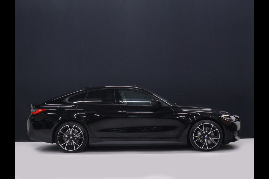 BMW i4 eDrive40 84 kWh [SCHUIFKANTELDAK, ADAPTIVE CRUISE CONTROL, APPLE CARPLAY, ANDROID AUTO, ACHTERUITRIJCAMERA, PDC V+A,STUURVERWARMING, BMW LED, NIEUWSTAAT]