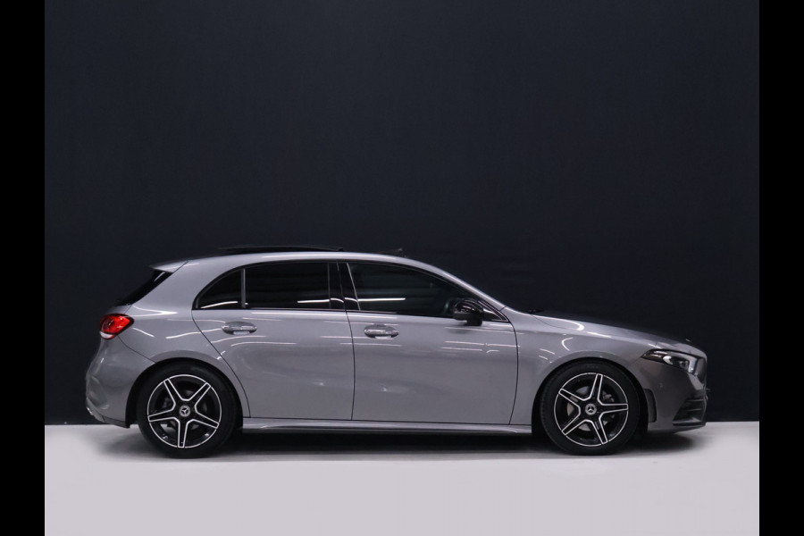 Mercedes-Benz A-Klasse 180 Business Solution AMG [SCHUIFKANTELDAK, MEMORY SEATS, SFEERVERLICHTING, CRUISE CONTROL, BLUETOOTH TELEFOON, ACHTERUITRIJCAMERA, PDC V+A, NIEUWSTAAT]