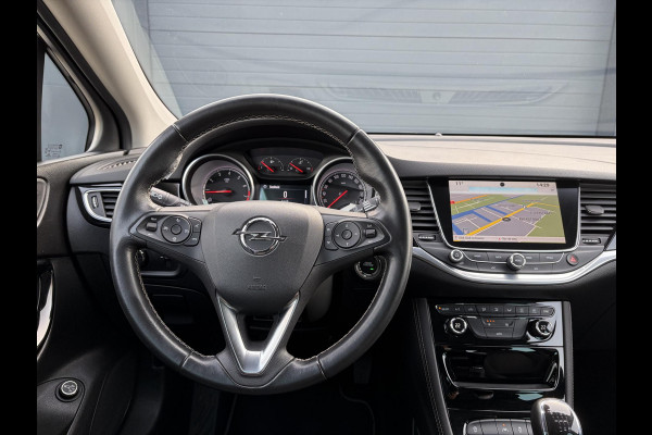Opel Astra Sports Tourer 1.4 Innovation Dealer Onderhouden,Navi,Camera,Trekhaak,150pk,Keyless,Rijstrooksensor,Halfleder,2e Eigenaar,Lm velgen,BSD,PDC V+A,N.A.P,Apk tot 12-2026